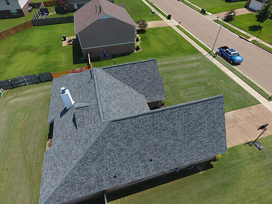 Residential roofing repair from drone inspection video.